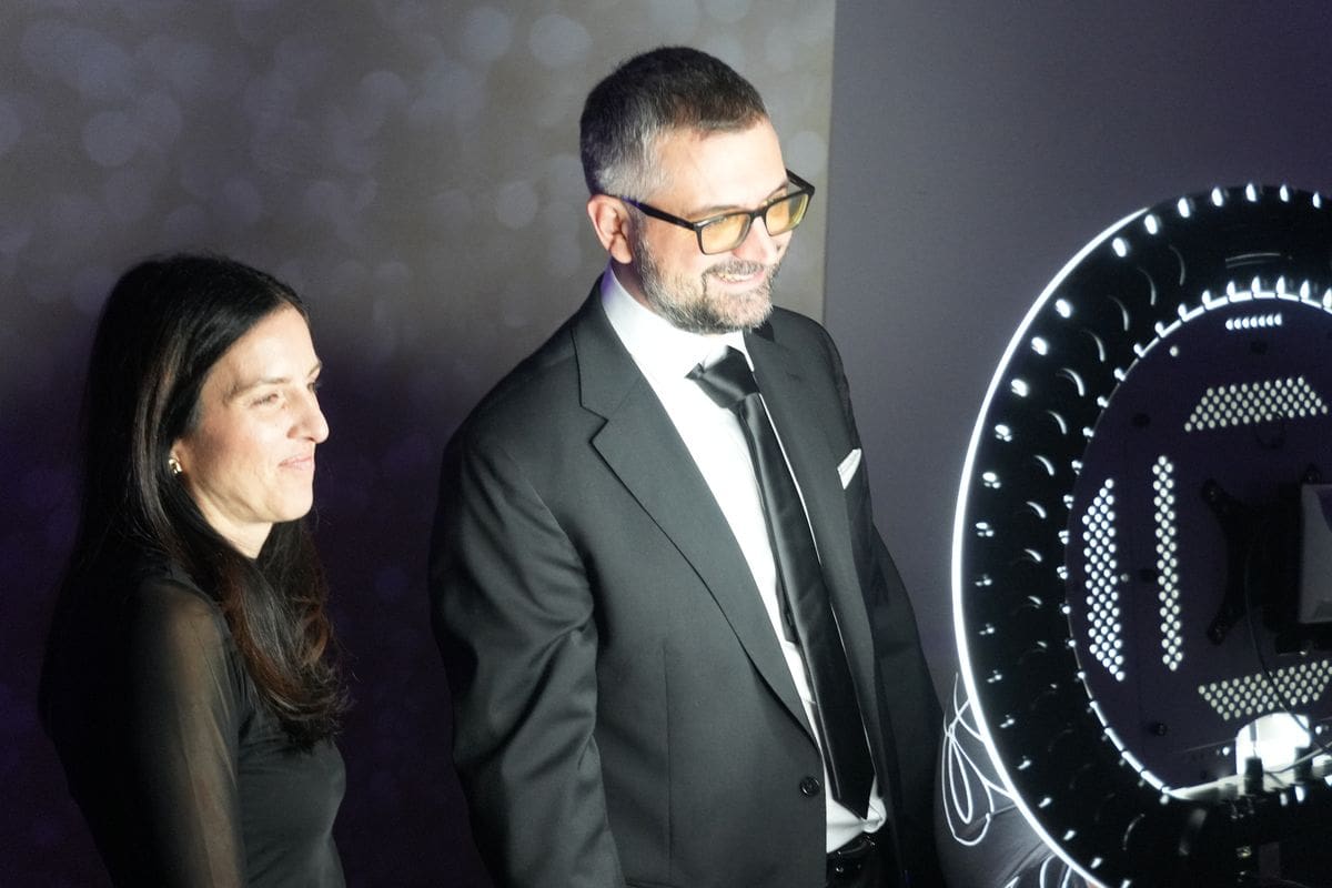 Elegantly dressed couple at a gala photo booth in Ottawa